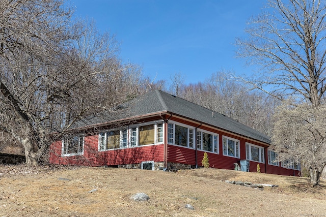 12 Old Forge Hollow Rd, Litchfield, CT 06750 - view of front of property with a shingled roof and a sunroom