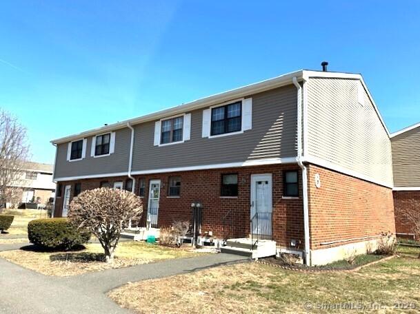 305 Hampton Ct Unit 305, Newington, CT 06111 - back of house featuring brick siding
