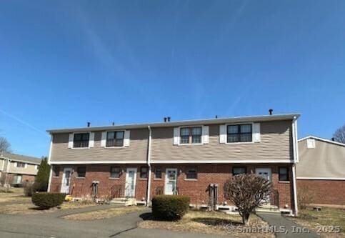 305 Hampton Ct Unit 305, Newington, CT 06111 - townhome / multi-family property with brick siding