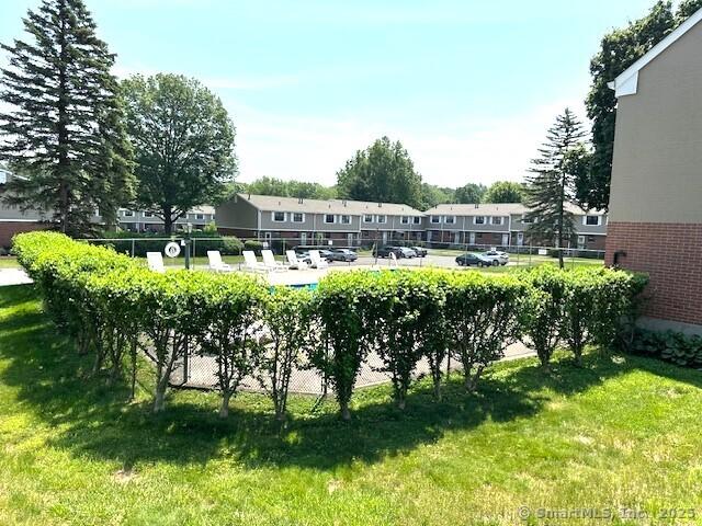 305 Hampton Ct Unit 305, Newington, CT 06111 - view of community with a residential view and uncovered parking