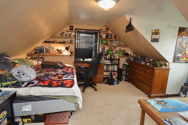 bedroom featuring lofted ceiling and carpet flooring