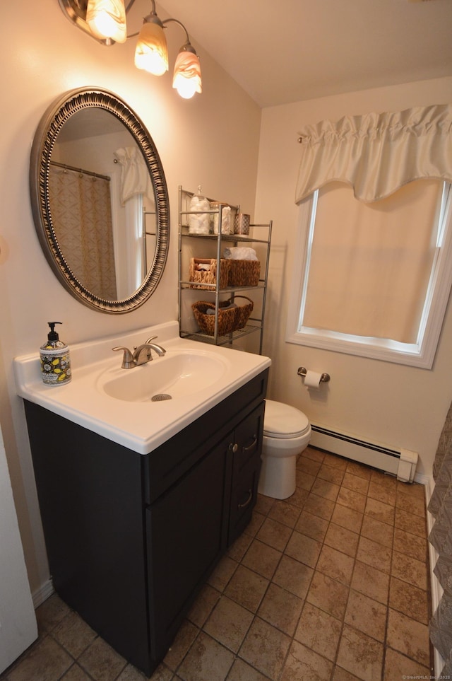 full bath featuring a baseboard heating unit, toilet, and vanity