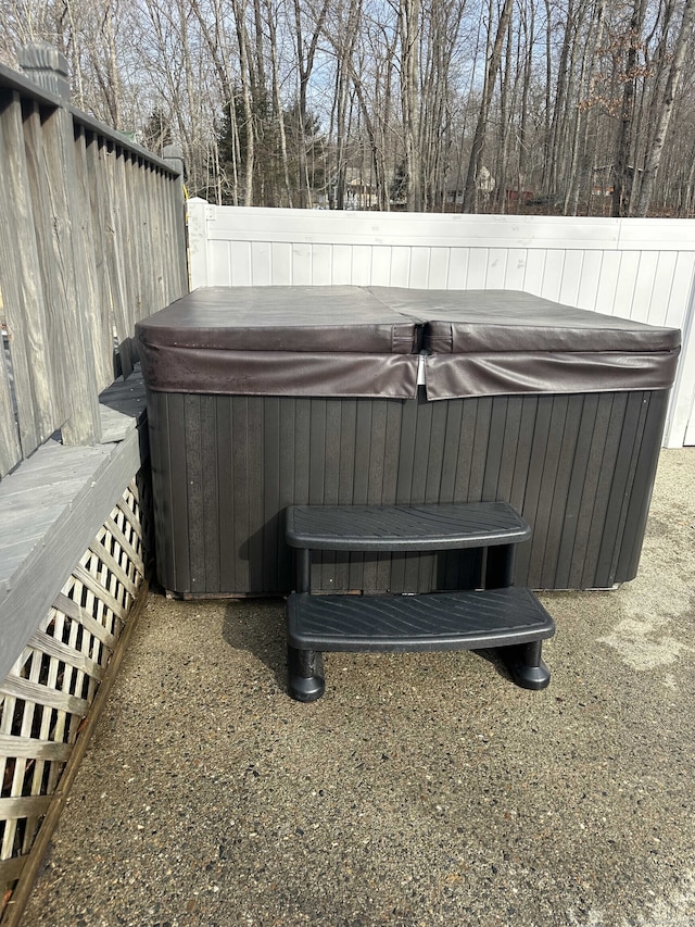 exterior space featuring a hot tub