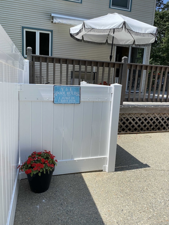 exterior space featuring a wooden deck