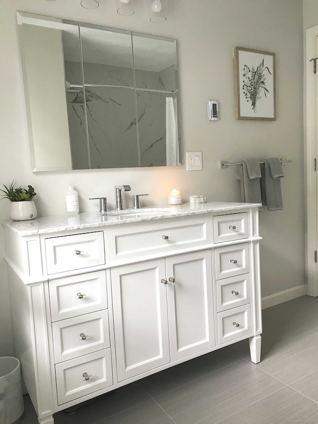 bathroom with vanity and a shower with shower curtain