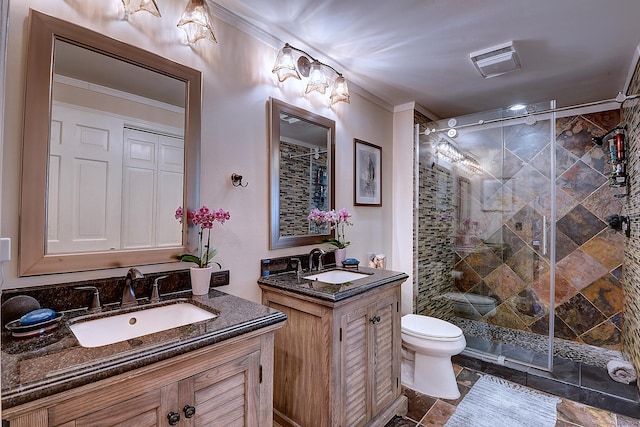 full bath featuring a sink, toilet, stone tile flooring, and a shower stall