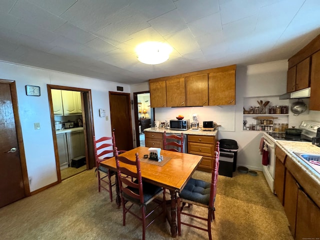 28 Bowhay Hill Rd, Branford, CT 06405 - kitchen featuring stainless steel microwave, brown cabinets, light countertops, and white electric stove