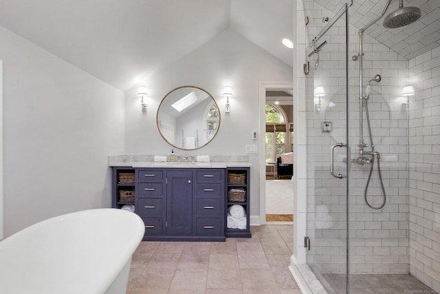 full bath with lofted ceiling, a stall shower, and vanity