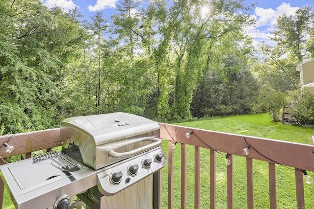 exterior space with grilling area and a yard