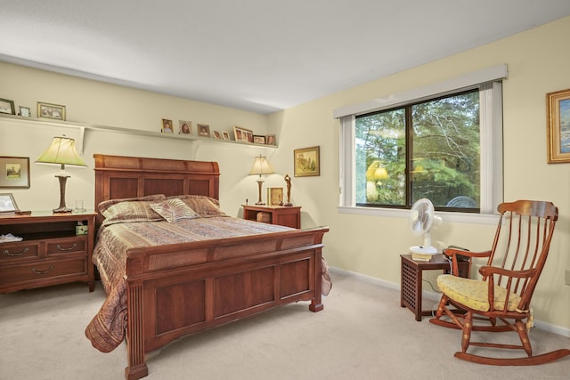 carpeted bedroom with baseboards