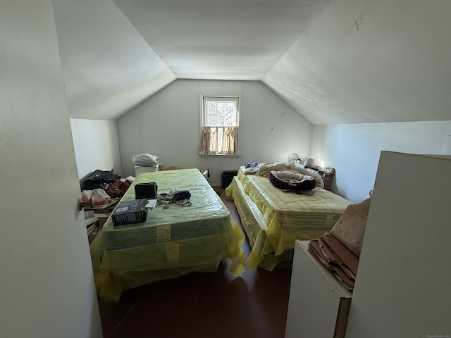 bedroom featuring vaulted ceiling