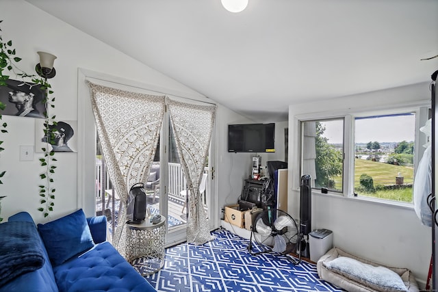 living area with vaulted ceiling