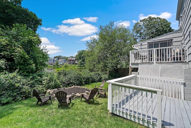 view of yard with a wooden deck