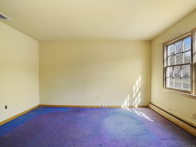 carpeted empty room with a baseboard radiator, baseboards, and visible vents