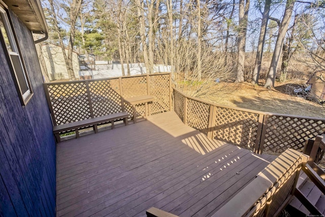 wooden deck featuring fence