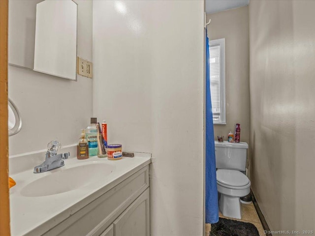 half bath with toilet and vanity