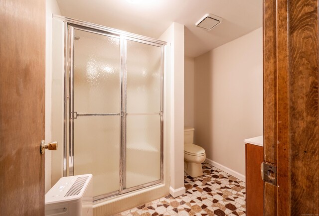 20 Musnug Rd, Danbury, CT 06811 - bathroom featuring toilet, baseboards, tile patterned floors, and a shower stall