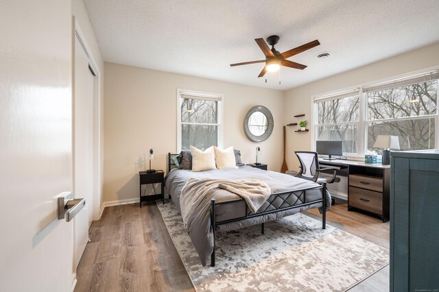 20 Musnug Rd, Danbury, CT 06811 - bedroom featuring a closet, wood finished floors, baseboards, and ceiling fan
