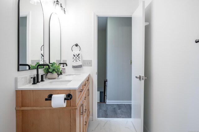 20 Musnug Rd, Danbury, CT 06811 - bathroom with marble finish floor, double vanity, and a sink