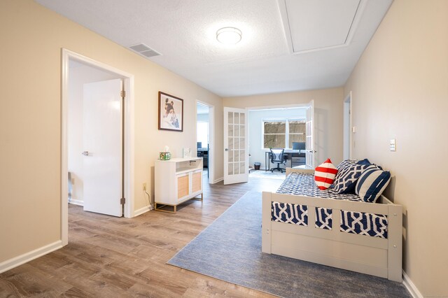 20 Musnug Rd, Danbury, CT 06811 - sitting room with a textured ceiling, baseboards, visible vents, and wood finished floors