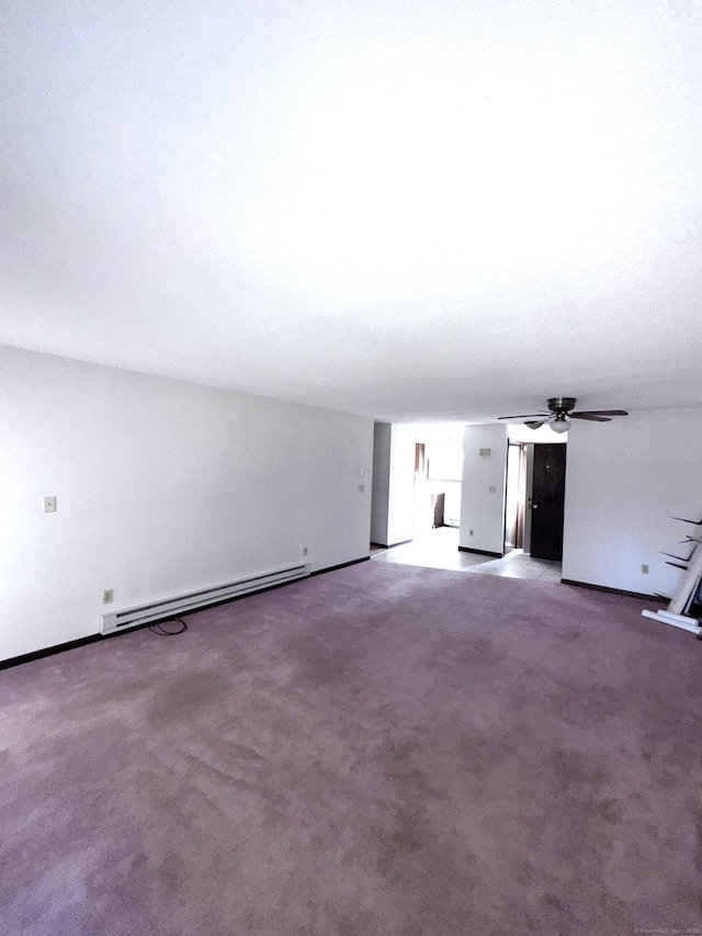 unfurnished living room featuring baseboard heating, a ceiling fan, and carpet