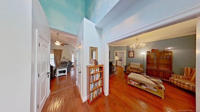 105 Mashentuck Rd, Killingly, CT 06239 - corridor with a chandelier, wood-type flooring, and a high ceiling