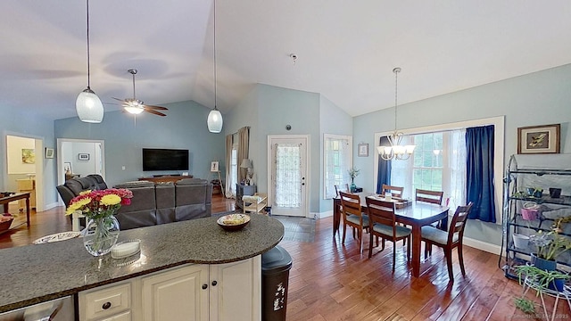 105 Mashentuck Rd, Killingly, CT 06239 - kitchen featuring a chandelier, lofted ceiling, wood finished floors, and baseboards