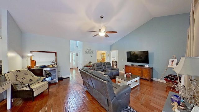 105 Mashentuck Rd, Killingly, CT 06239 - living room with ceiling fan, hardwood / wood-style floors, vaulted ceiling, and baseboards