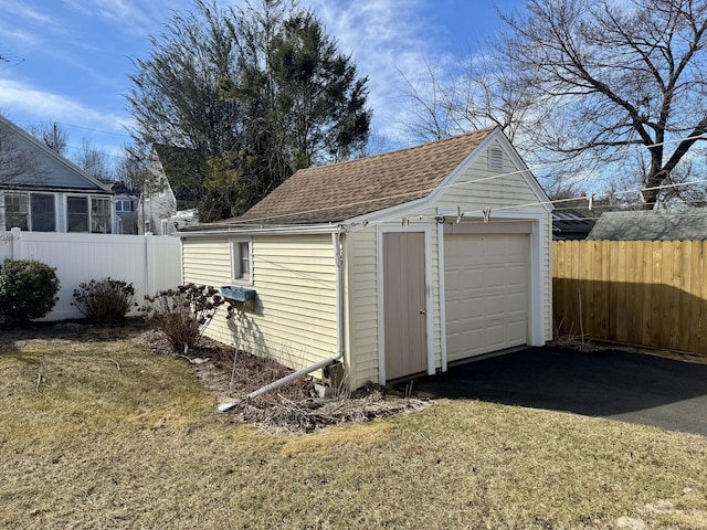 detached garage with fence