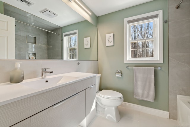 full bathroom with vanity, baseboards, visible vents, tile patterned floors, and toilet