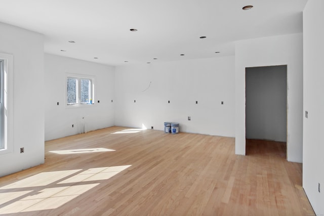 unfurnished room featuring recessed lighting and light wood-style floors