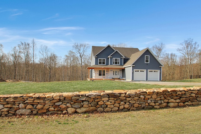 25 S Rd, Bozrah, CT 06334 - view of front facade featuring roof with shingles, driveway, a porch, an attached garage, and a front yard