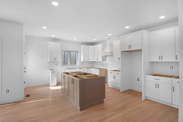 25 S Rd, Bozrah, CT 06334 - kitchen with light wood-style floors, a center island, baseboards, and custom range hood