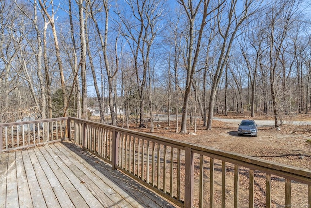 deck featuring a wooded view