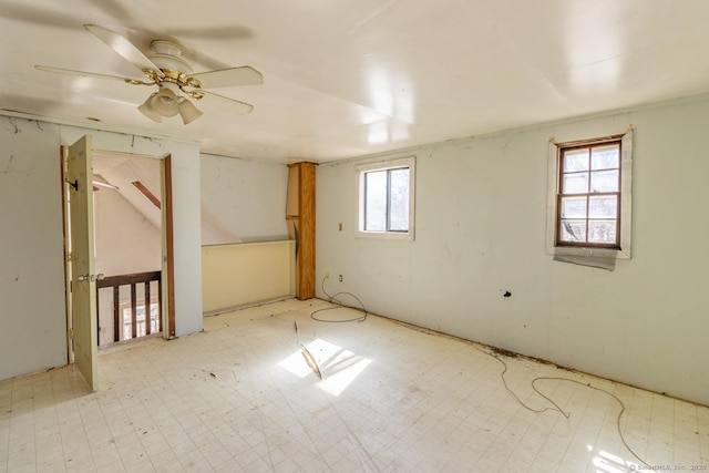 interior space featuring tile patterned floors and ceiling fan