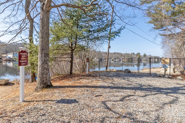 view of water feature with fence