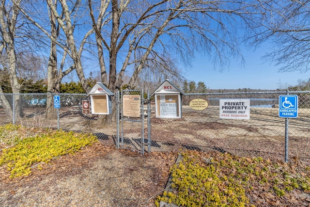 exterior space featuring a gate and fence