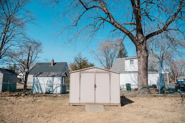 view of shed featuring a fenced backyard