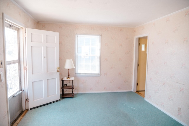 interior space featuring plenty of natural light, wallpapered walls, and baseboards