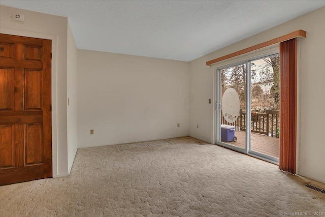 827 Oronoke Rd Apt 2-11, Waterbury, CT 06708 - unfurnished room featuring visible vents and carpet