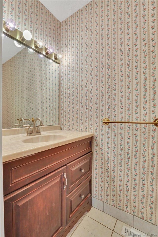 827 Oronoke Rd Apt 2-11, Waterbury, CT 06708 - bathroom featuring tile patterned floors, wallpapered walls, and vanity