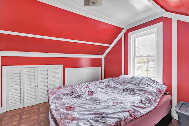 bedroom featuring vaulted ceiling