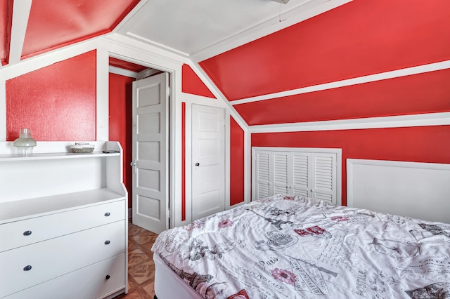 bedroom featuring vaulted ceiling