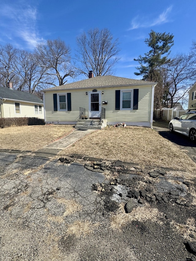 view of front of property with a chimney