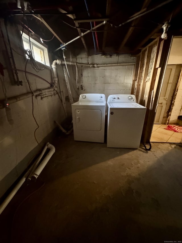 basement featuring separate washer and dryer