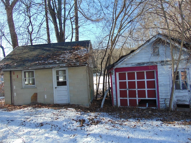 view of snow covered garage