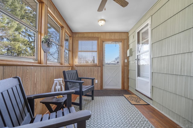 sunroom with a ceiling fan