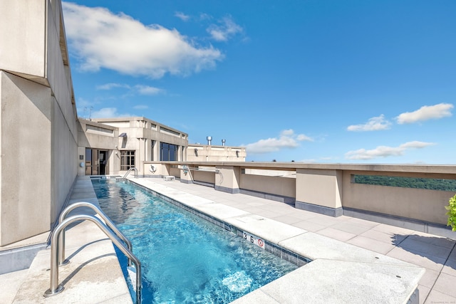 pool with a patio