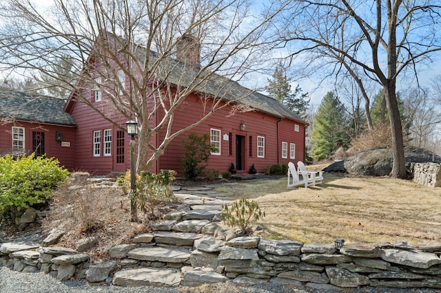 exterior space featuring a chimney