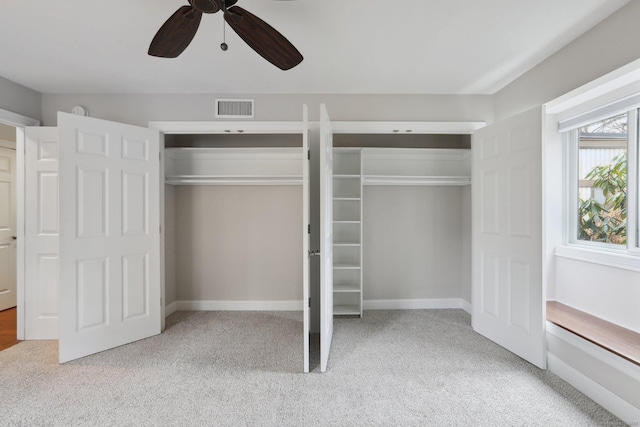 1042 Heritage Vlg Unit A, Southbury, CT 06488 - unfurnished bedroom featuring carpet floors, multiple closets, a ceiling fan, and baseboards